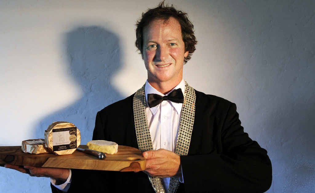 Justin Telfer owner and cheesemaker of Bangalow Cheese Co with his winning champion Nashua Washed Rind cheese at Sydney Royal Cheese Dairy Produce Show. Justin Telfer owner and cheesemaker of Bangalow Cheese Co with his winning champion Nashua Washed Rind cheese at Sydney Royal Cheese Dairy Produce Show.